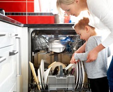 Mother and Son Loading Dishwasher.jpg