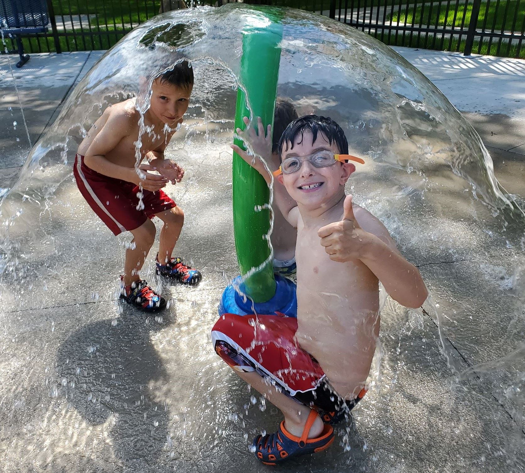 boys under the fountain